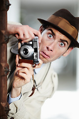 Image showing Retro agent man, street and camera for investigation, inspection and spy job in city with surprise face. Private investigator, secret photographer and vintage paparazzi in metro for surveillance