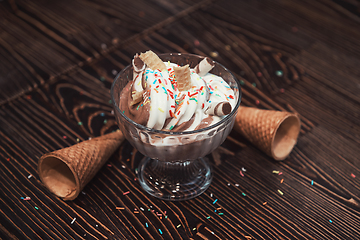 Image showing Ice-cream on wooden