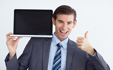 Image showing Business man, portrait and laptop screen with thumbs up for review, opinion and mockup space by white background. Businessman, entrepreneur and computer for news, vote or about us for brand in studio