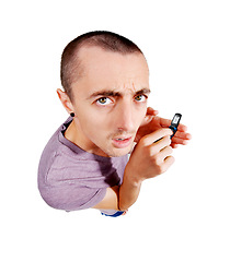 Image showing Man, phone and confused in studio portrait with texting, typing or frown by white background. Young male student, annoyed model and chat with cellphone for communication, search or social network app