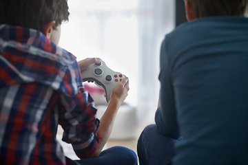 Image showing Boys playing video game, controller and friends gaming with technology, esports and entertainment with back view. Gamer kids play games on console at home, youth and male children have fun together