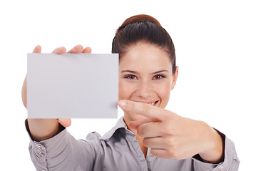 Image showing Mockup, paper and portrait of business woman in studio for idea, networking and idea. Corporate, signage and happy with female employee pointing to card on white background for news and presentation