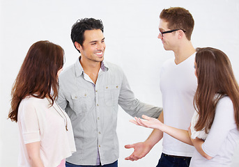 Image showing Business, group and staff brainstorming, collaboration and discussion with people isolated against white studio background. Employees, men and women share ideas, planning or partnership with teamwork