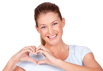 Image showing Love, care and portrait of woman doing heart sign, shape or gesture with hands isolated on a white studio background. Happy, casual and female person with happiness, care and kindness signal