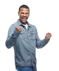 Image showing Yes, excited and man celebration portrait in studio with casual fashion and happiness from win. Smile, winning and achievement of a African male and model with white background and winner fist