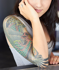 Image showing Tattoo, punk and woman arm with art design and unique creative style isolated in a black background. Identity, graphic and artistic female person or artist with ink on her skin for creativity
