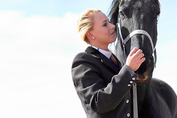 Image showing Horse, sport and woman on equestrian training and competition ground with blue sky. Outdoor, sun female competitor and show horses stable with a rider athlete and animal with mockup in nature