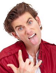 Image showing Man in portrait with tongue out, rock hand gesture and facial expression isolated on white background. Punk, rocker and emoji with crazy face in studio, male model with energy and devil horn symbol