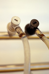 Image showing Equipment, pipe and closeup in a brewery or distillery for the production or fermentation of alcohol. Beer, manufacturing and brewing in an empty factory, plant or warehouse in the beverage industry