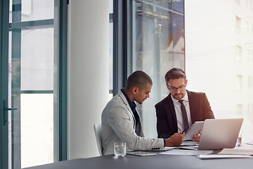 Image showing Tablet, laptop and business men planning in conference room meeting, teamwork and discussion of corporate data. Professional people or partner talking, review or report analysis on digital technology