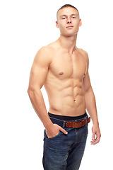 Image showing Muscle, portrait and man with beauty, sexy and confident guy isolated against a white studio background. Face, male person and model with abs, abdomen and tors with bodybuilder, wellness and health