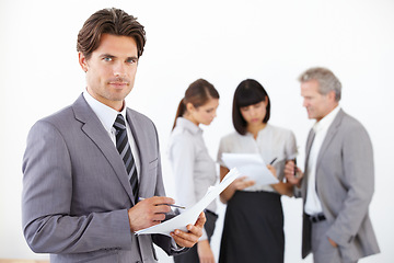 Image showing Businessman, portrait and documents in meeting or leadership for corporate finance at the office. Young handsome man or entrepreneur with paperwork for financial management or teamwork at workplace