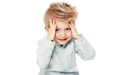 Image showing Portrait, child and peeking from hands in studio isolated on a white background mockup space. Smile, peekaboo and boy kid playing game, happiness and having fun while enjoying quality time alone.