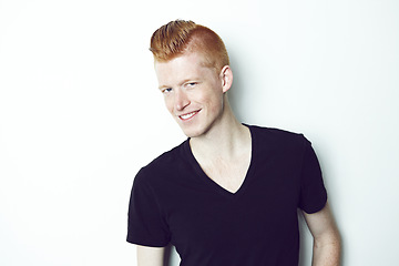 Image showing Smile, ginger and portrait of a man with style isolated on a white background in a studio. Happy, young and a male fashion model with confidence, happiness and cool in a shirt on a backdrop or wall