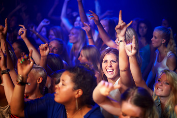 Image showing Party, music concert and crowd dancing, happiness and cheerful with joy, fun and night club. Portrait, group or people with a smile, friends or bonding with celebration, social gathering and festival