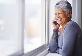 Image showing Phone call, smile and elderly woman talking, speaking and chat on mobile conversation, discussion or networking. Communication, window and relax senior person talk to cellphone contact