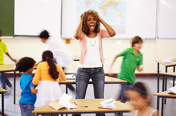 Image showing Stress, teacher screaming and black woman in classroom with children running around. Education, headache and female person shouting with burnout, tired or fatigue with kids in busy class at school.