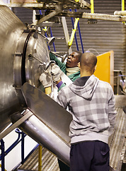 Image showing Man winery worker, steel vat and checking on the winemaking process together in factory. Men working on wine maker on vats in cellar with metal tank in alcohol production or fermentation at warehouse