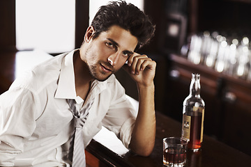 Image showing Business man, drinking and portrait in happy hour at a bar with alcohol and whiskey after work. Bottle, male person and face in a restaurant with a playboy guy and a glass and confidence in pub