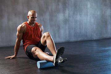 Image showing Foam roller , mockup of man training or workout and at gym. Personal trainer or fitness pain relief, exercise and motivation. Athlete or sportsman, male person stretching or warm up and focus