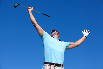 Image showing Golf, winner and man with hands up in celebration on blue sky background, victory and excited. Sports, success and male golfer celebrating achievement, winning and training goal while playing outdoor