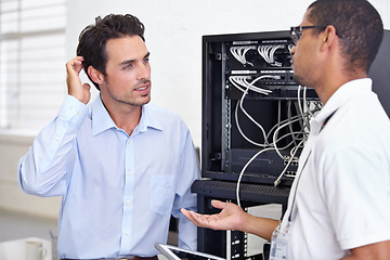 Image showing Server room, it support and confused with a technician explaining to a business man about cyber security. Network, database and risk consulting with an engineer talking about information technology