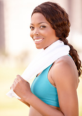 Image showing Fitness towel, black woman and portrait with happiness from exercise and sport. Workout, African person and female face feeling healthy and happy from sports training and wellness empowerment