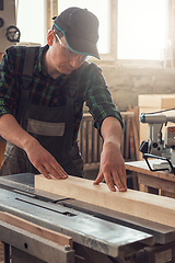 Image showing Worker making the wood box