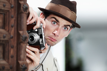 Image showing Retro photographer man, street and camera on investigation, inspection or suspicious journalist job in city. Private investigator, secret spy or vintage paparazzi with surprise for surveillance intel