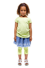 Image showing Cute, African child and portrait of young girl in a studio with happiness and kids fashion. White background, full body and smile of kid with youth and children style feeling confident from clothing