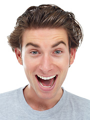 Image showing Excited, face and man portrait in a studio with happiness from deal and announcement with smile. Isolated, white background and male person face shouting from good news, winning and surprise