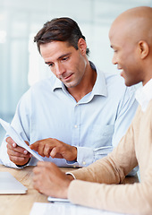 Image showing Business, documents and men in a meeting for planning, brainstorming and solution in office. Admin, report and people in creative collaboration for startup, budget and company growth, mission or goal