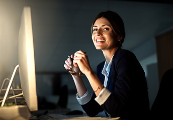 Image showing Portrait, smile and businesswoman employee at night or glasses and pc in an office. Corporate, dark and female worker or project manager in the evening or company emails and dedicated on computer