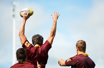 Image showing Back, ball and men training, rugby and fitness with a healthy lifestyle, energy or wellness on a field. Male athletes, professional players or group with sports, competition and workout with teamwork