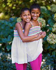 Image showing Friends, children or twin sisters portrait outdoor while playing and happy in nature, backyard or park. Girl kids or family together for hug, trust and love in natural green garden for fun in Jamaica