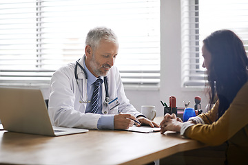 Image showing Doctor, paperwork and talking to a woman patient at hospital for a consultation or health insurance. A man listening to a happy female person in office for signature consent, support or medical help