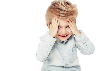 Image showing Portrait, kid smile and peekaboo in studio isolated on a white background mockup space. Peeking from hands, boy and face of child playing game, happiness and having fun while enjoying quality time.