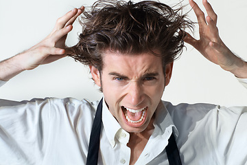 Image showing Crazy, scream and portrait of business man on white background with stress, frustrated and anger. Mental health, depression and face of male worker shouting, stressed out and messy hair in studio