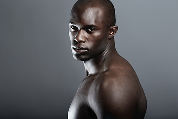 Image showing Art, beauty and portrait of black man on dark background with muscle and mockup, serious body builder in Africa. Health, wellness and mock up space, African male model isolated on studio backdrop.