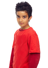 Image showing Isolated boy child, studio portrait and fashion with red t-shirt, confident and cool by white background. Male indian kid, student and clothes for punk aesthetic, youth and preteen by backdrop