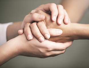 Image showing Empathy, support and love with people holding hands in comfort, care or to console each other. Trust, help or healing with friends praying together during depression, anxiety or the pain of loss