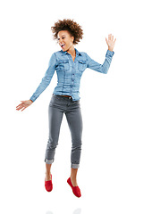 Image showing Dance, happy young black woman jumping and in white background. Energy or positivity, person expressing freedom and isolated African female model jump for joy or excitement in studio backdrop