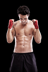 Image showing Man, shirtless and fists in boxer bandage or focus, thinking and ready for boxing fight in isolated studio black background. Athlete, martial arts and healthy fitness, strong fighter and sports