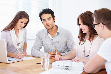 Image showing Planning, portrait and business people in meeting at work for strategy, collaboration or teamwork. Talking, corporate and group of employees brainstorming, writing notes and communication about ideas