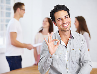 Image showing OK hand, happy man and portrait in office meeting with success sign, achievement or yes for employee engagement. Face of person with like, happy and okay emoji for career startup goals and management