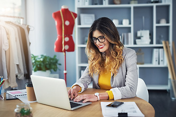 Image showing Fashion, laptop and woman designer happy and typing proposal and planning startup sales on the internet or online. Ecommerce, retail and working small business entrepreneur of a boutique in a office