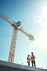 Image showing Building roof, tablet and engineer team talking about construction vision, development or architecture. Black woman and man outdoor for engineering, innovation or safety discussion with sky mockup