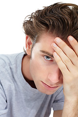 Image showing Portrait, depression and man with stress, anxiety and human isolated against a white studio background. Face, male person and guy with sadness, depression and mental health issue with frustration