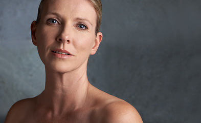 Image showing Mature woman, skin care and portrait with natural beauty and cosmetic dermatology. Isolated, gray background and female person face with facial treatment and mock up with anti aging cosmetics