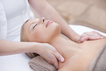 Image showing Hands of masseuse, woman getting neck massage in spa and wellness with peace, tranquility and holistic treatment. Stress relief, zen and female person at luxury resort with self care and body healing